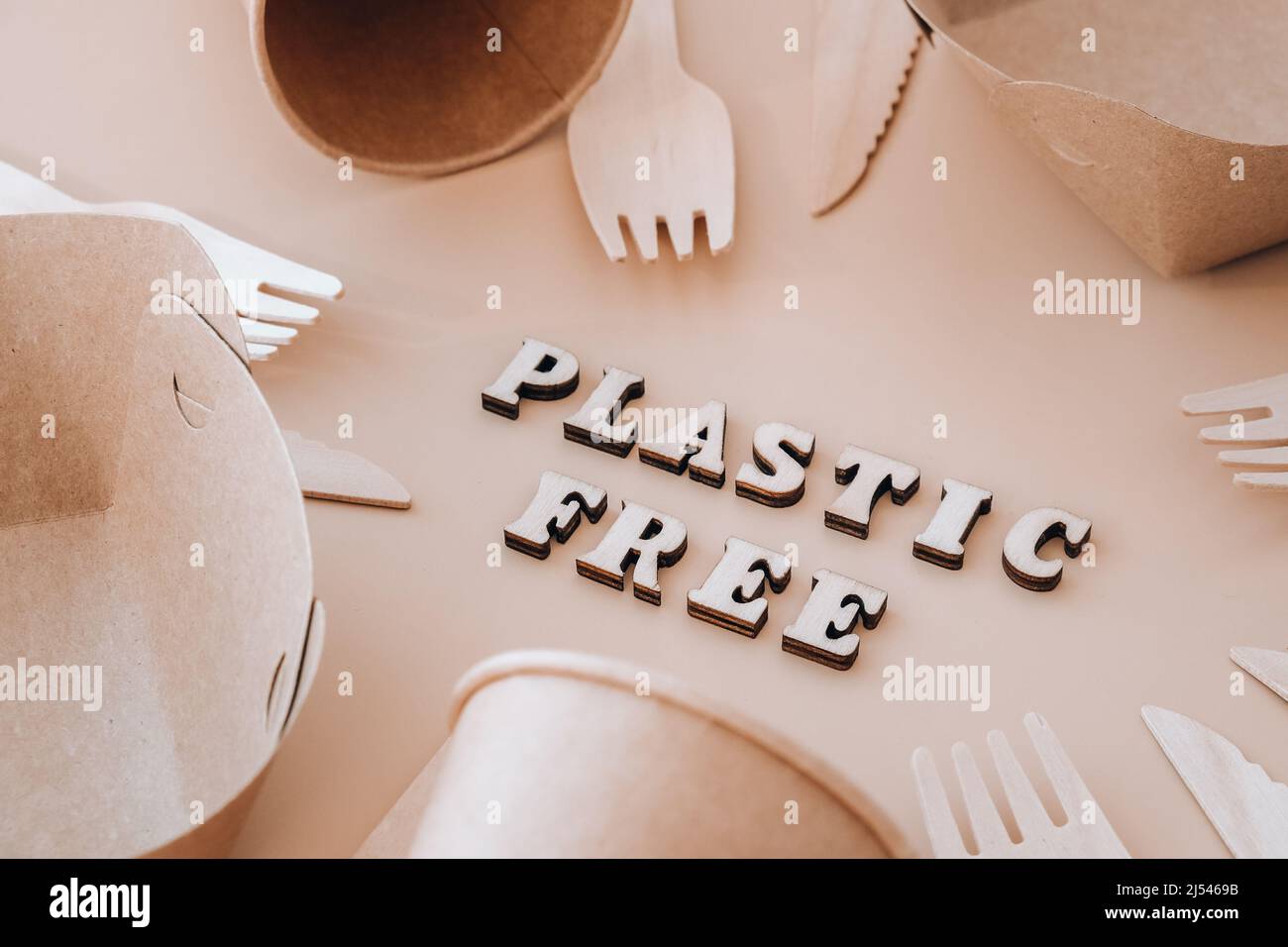 PLASTIC FREE text around Eco friendly, disposable, recyclable, compostable tableware. Paper food