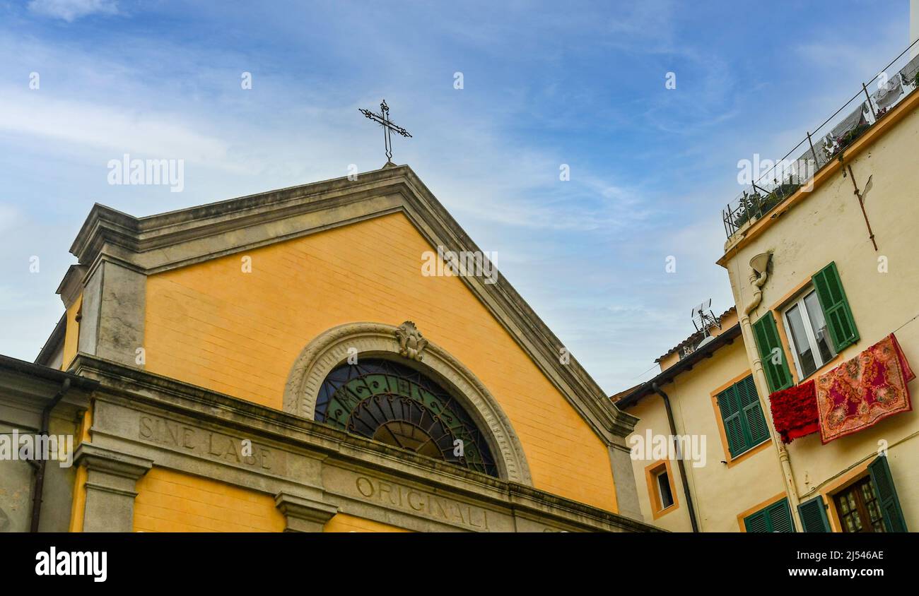 Low-angle view of the top of the Oratory of the Immaculate in Piazza San Siro square, old town of Sanremo, Imperia, Liguria, Italy Stock Photo
