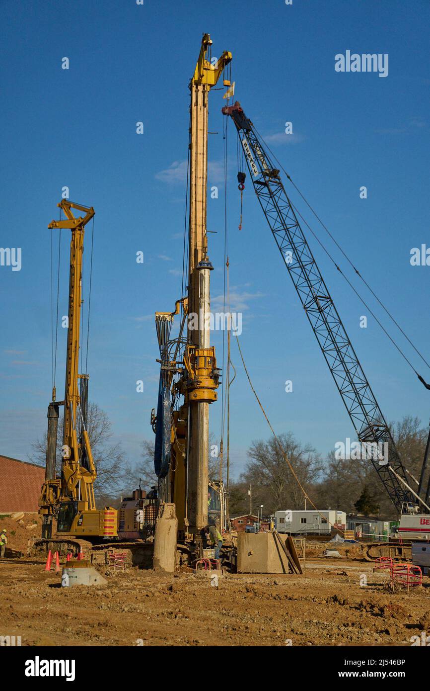Contractors drill at the site of the new Van Voorhis Elementary School in  Fort Knox, Kentucky, March 28, 2022. Possible negative impact from wet clay  soil has required the installation of about