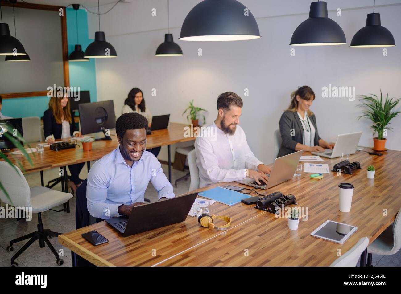 Group of colleagues working on project Stock Photo