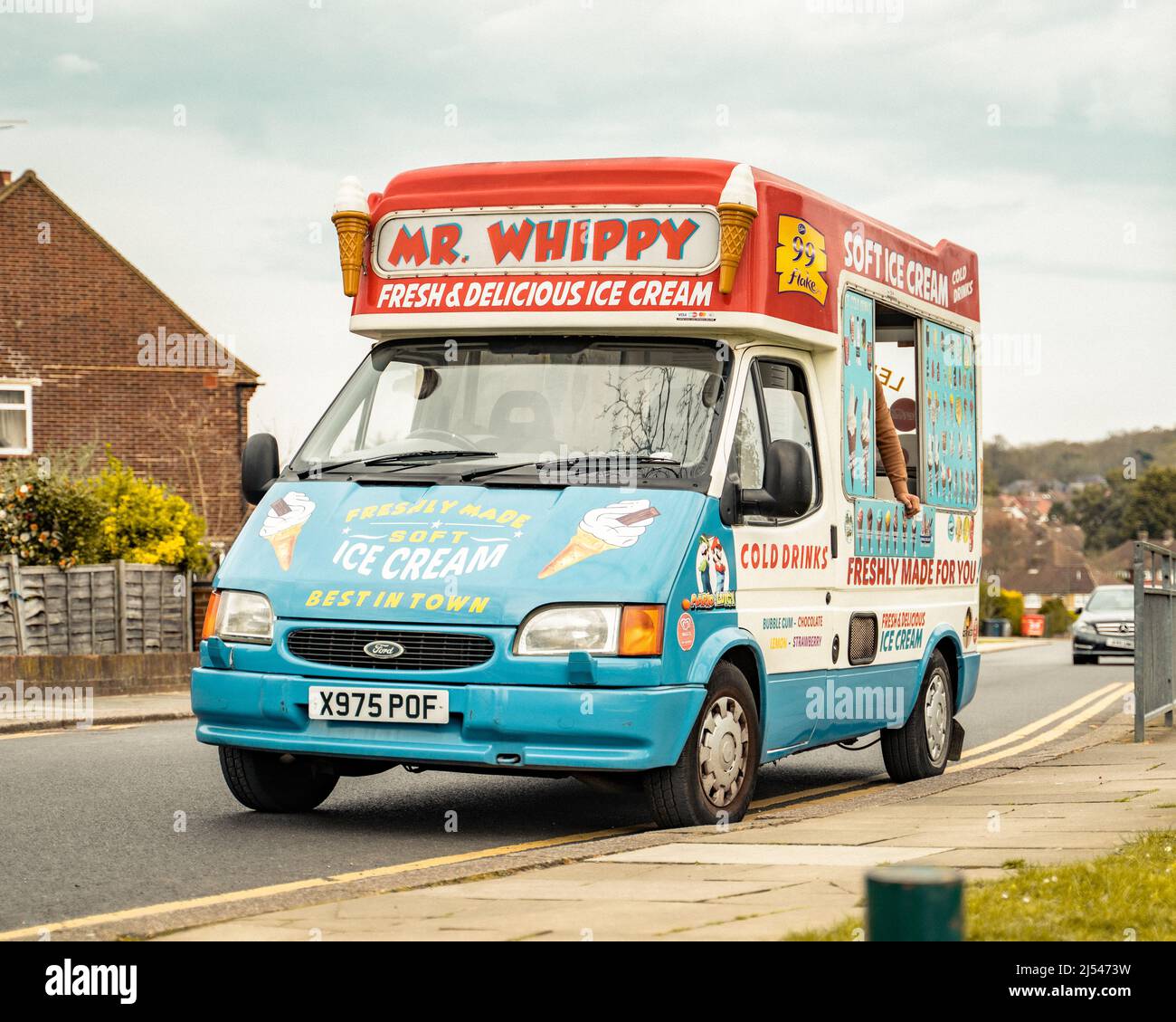 City Of London, London, UK - April 11, 2022: A classic Ice-Cream van is parked up and ready to sell some ice cream to the general public. Stock Photo