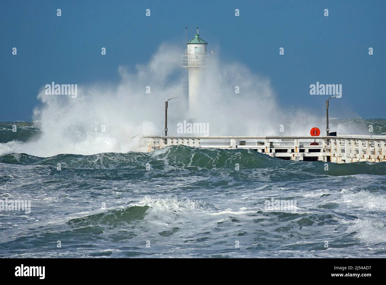 Lighthouse in Nieuwpoort at the storm Corrie, Belgium, West Flanders, Nieuwpoort Stock Photo