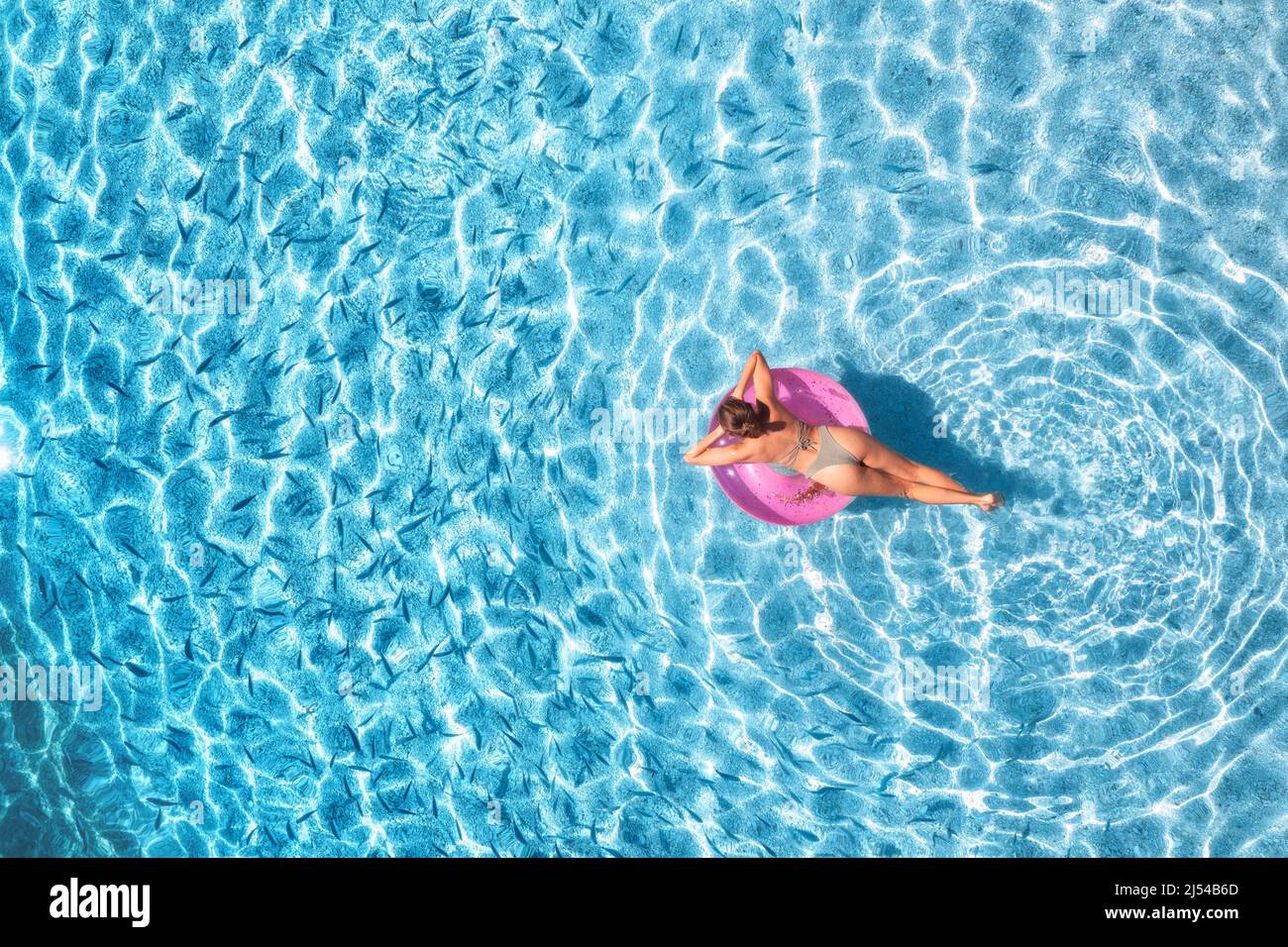 Swim ring woman hi-res stock photography and images - Alamy
