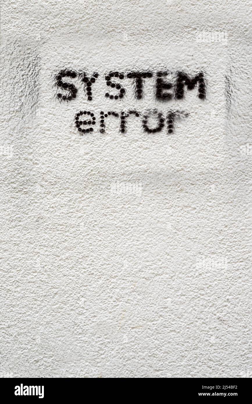 system error was sprayed on a wall, symbol for change , Austria Stock Photo
