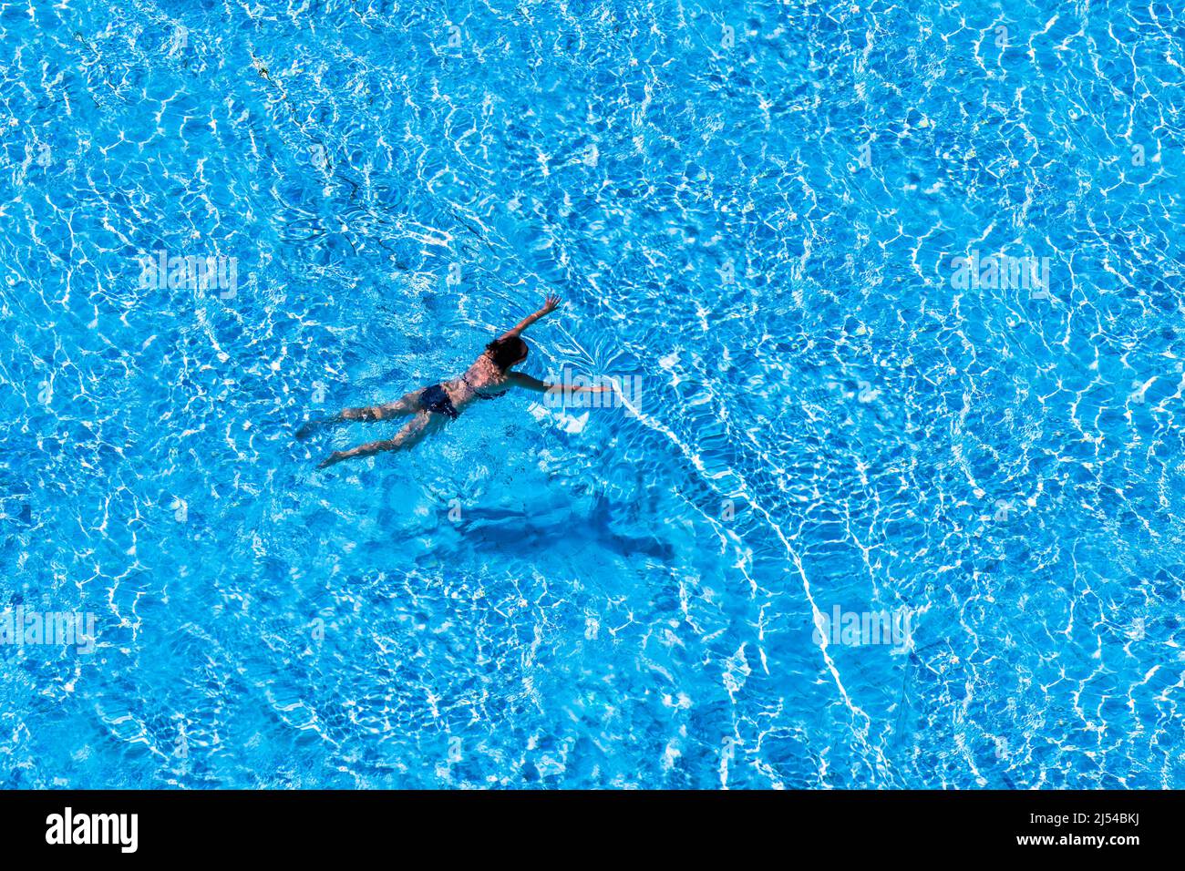 woman swimming in a pool , Austria Stock Photo