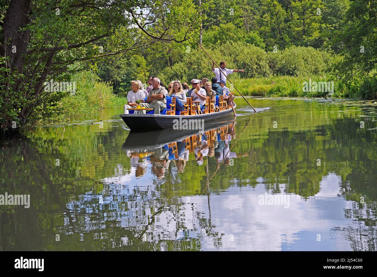 Tourists in a typical barge on river Spee at the Spreewald near Schlepzig, Germany, Brandenburg Stock Photo