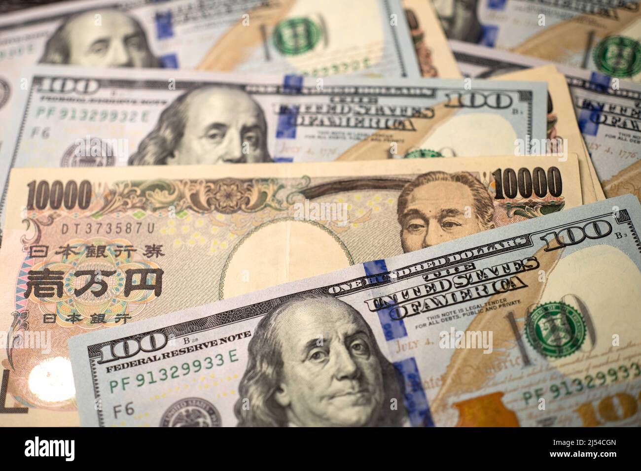 Tokyo. 20th Apr, 2022. Photo taken on April 20, 2022 shows the Japanese yen and U.S. dollar banknotes in Tokyo, Japan. The Japanese yen has weakened markedly this year as major central banks in Europe and the United States have shifted monetary policies. Credit: Zhang Xiaoyu/Xinhua/Alamy Live News Stock Photo