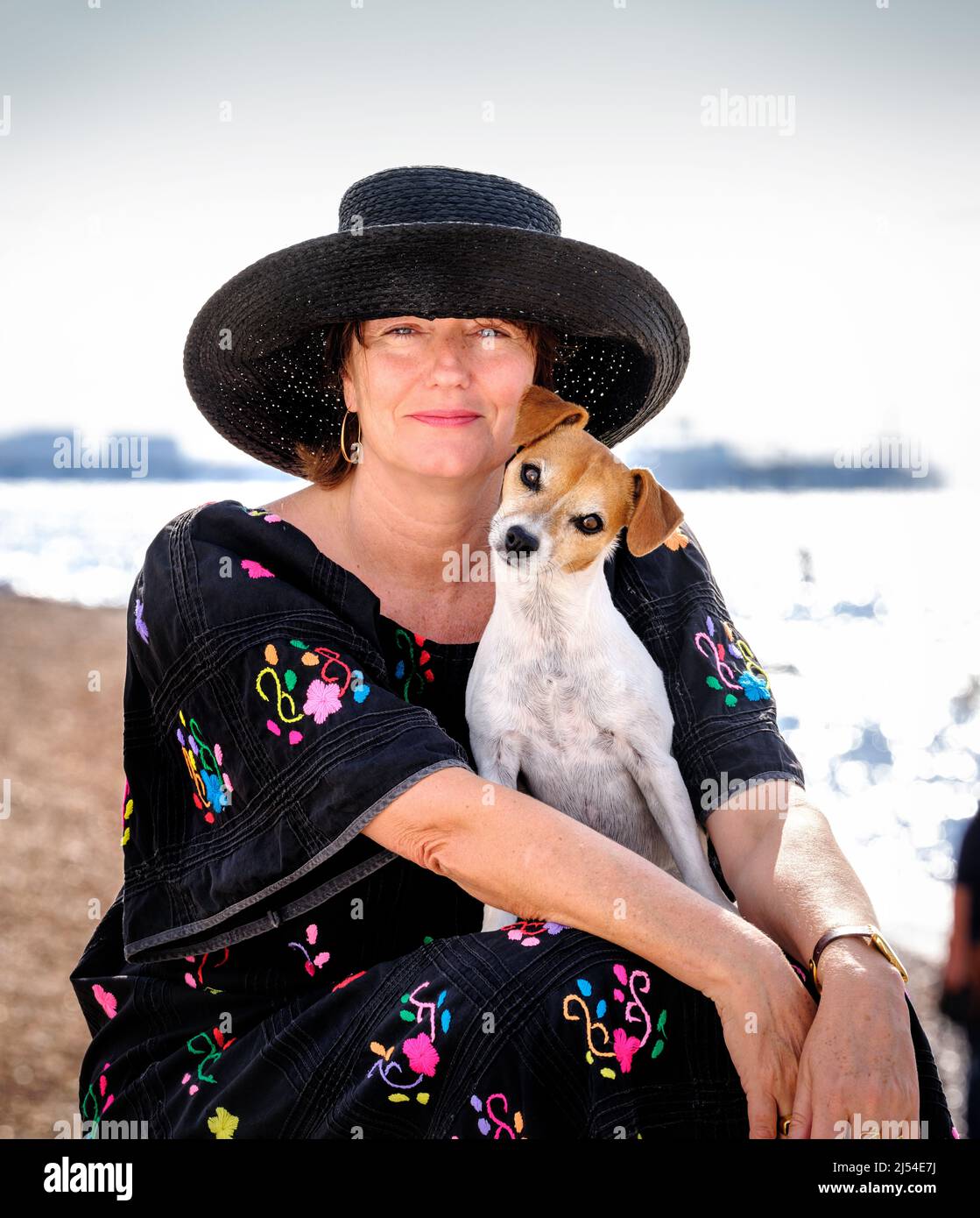 Editorial Use Only - Actress Anna Chancellor on Brighton beach with her dog, Fig. Picture by Jim Holden Stock Photo