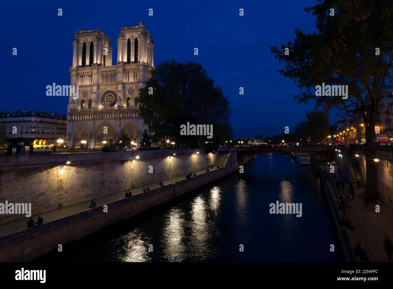 Notre Dame Cathedral and River Seine at night, Paris, France, Europe Stock Photo