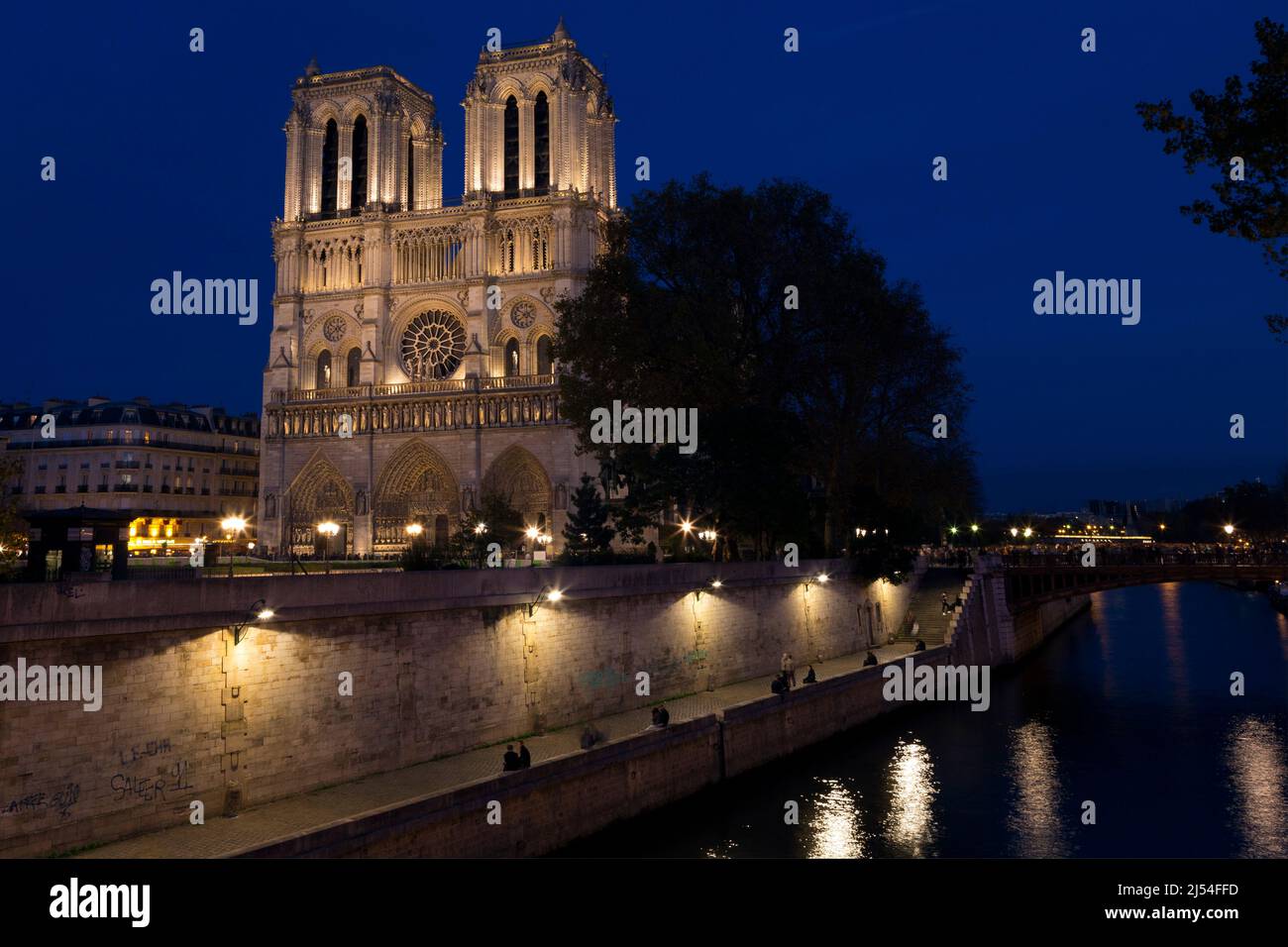 Notre Dame Cathedral and River Seine at night, Paris, France, Europe Stock Photo