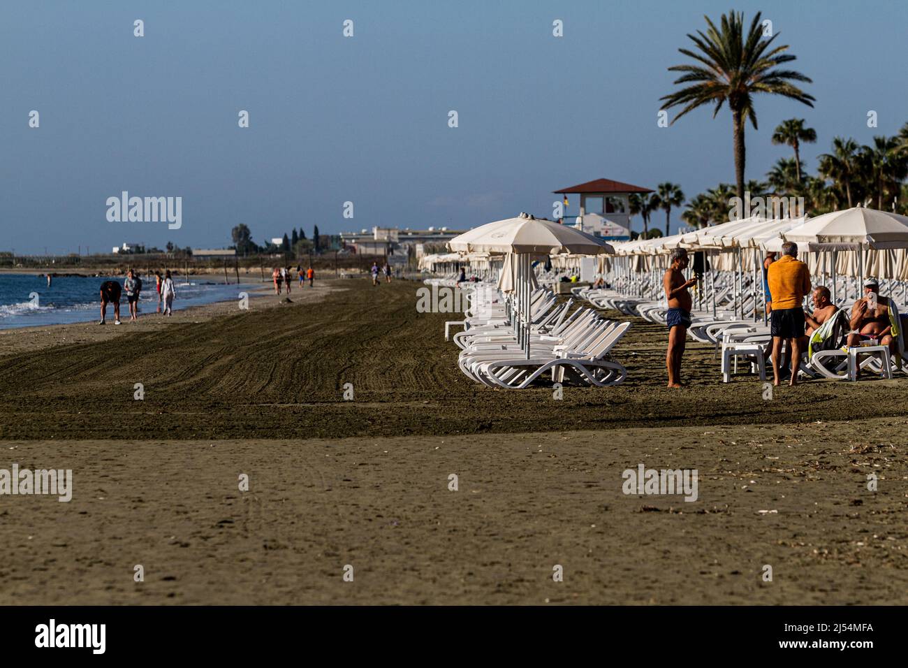 Larnaca, Cyprus. 20th Apr, 2022. People are seen in Mackenzie Beach, Larnaca, Cyprus, on Apr. 20, 2022. The government of Cyprus is considering approaching new tourist markets in order to cover the gap left in the tourist industry by the situation in Ukraine. The Russian and Ukrainian tourists form up to 25% of the Cypriot tourist market. (Photo by Kostas Pikoulas/Sipa USA). Credit: Sipa USA/Alamy Live News Stock Photo
