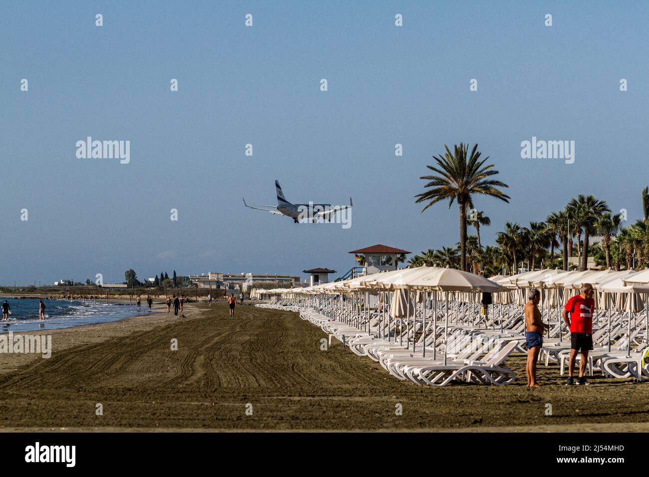 Larnaca, Cyprus. 20th Apr, 2022. An EL Al airlines plane is landing at Larnaca International airport as seen from Mackenzie Beach, Larnaca, Cyprus, on Apr. 20, 2022. The government of Cyprus is considering approaching new tourist markets in order to cover the gap left in the tourist industry by the situation in Ukraine. The Russian and Ukrainian tourists form up to 25% of the Cypriot tourist market. (Photo by Kostas Pikoulas/Sipa USA). Credit: Sipa USA/Alamy Live News Stock Photo