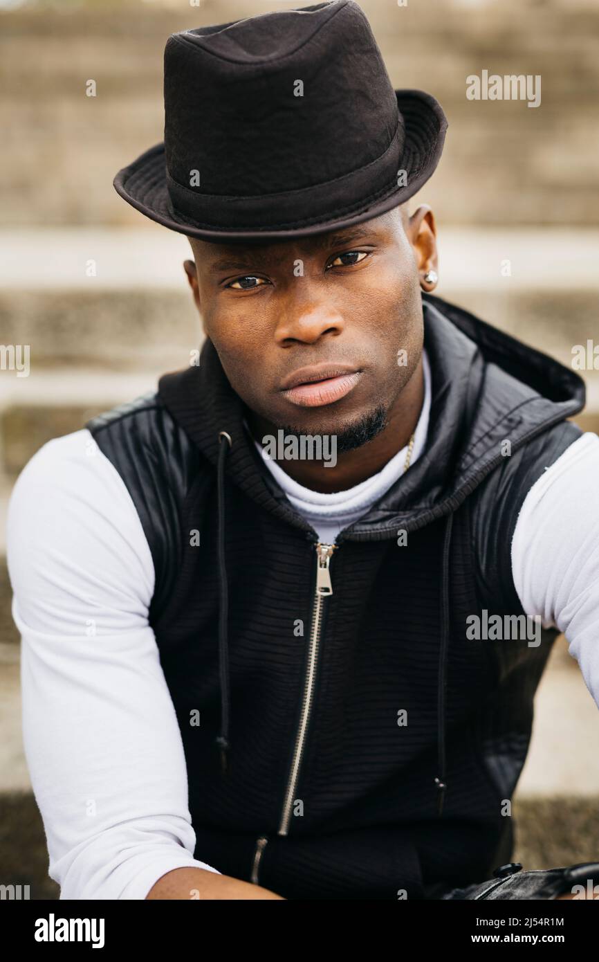 Handsome male wearing black hat hi-res stock photography and images - Alamy