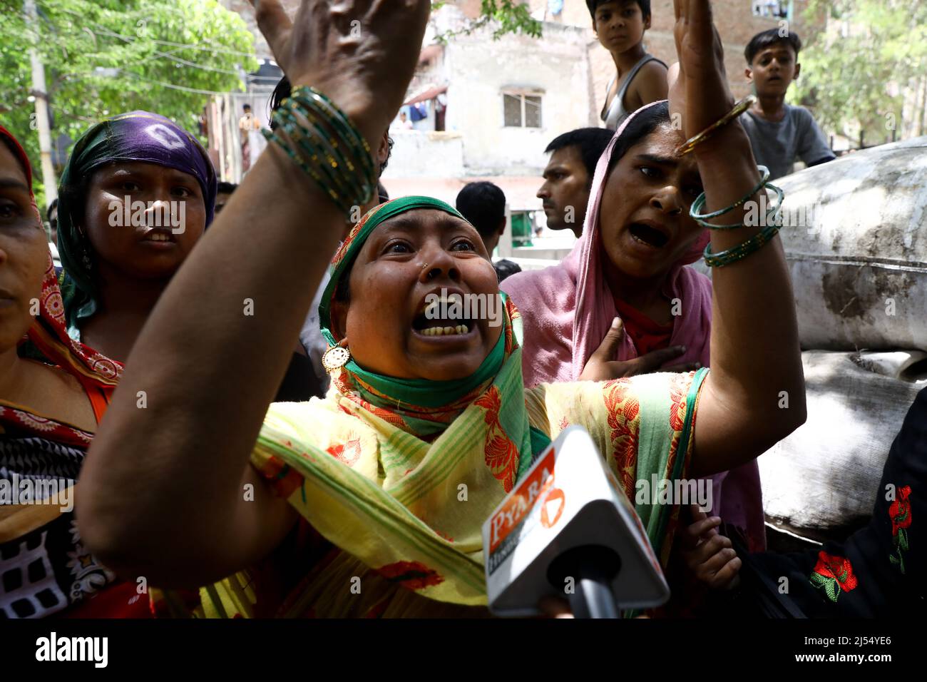 New Delhi, New Delhi, India. 20th Apr, 2022. Residents react after Officials demolish a part of a Mosque in a communally sensitive area in Jahangirpuri. (Credit Image: © Karma Sonam Bhutia/ZUMA Press Wire) Stock Photo