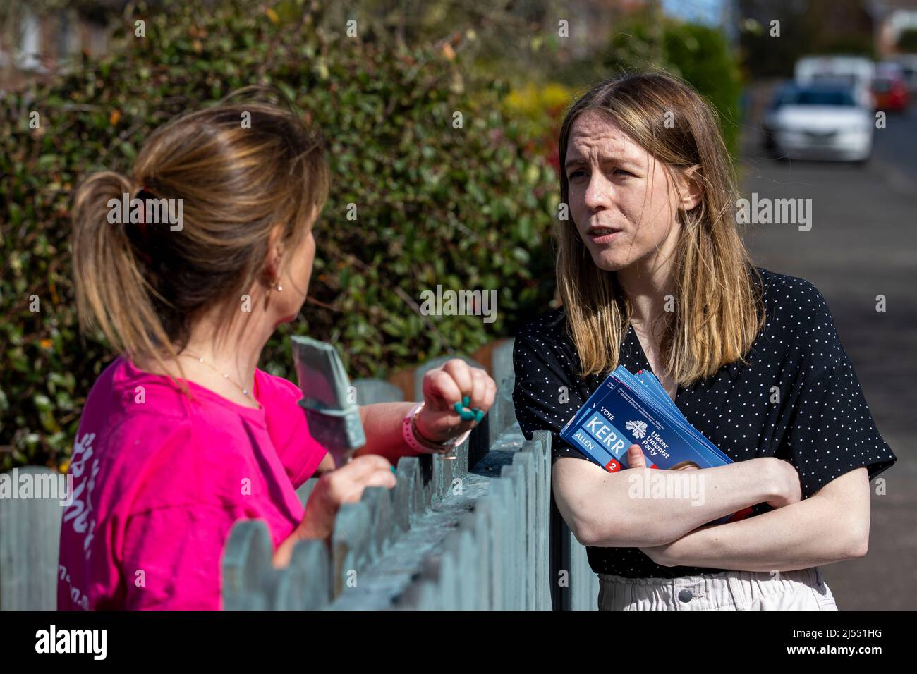 Lauren Kerr (right), UUP Belfast East candidate in upcoming the 2022 Northern Ireland Assembly election speaking with Jenny Elwood while canvassing in east Belfast. Stock Photo