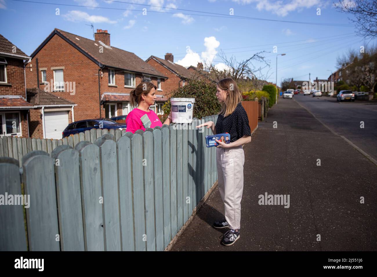 Lauren Kerr (right), UUP Belfast East candidate in upcoming the 2022 Northern Ireland Assembly election with speaking with Jenny Elwood while canvassing in east Belfast. Stock Photo