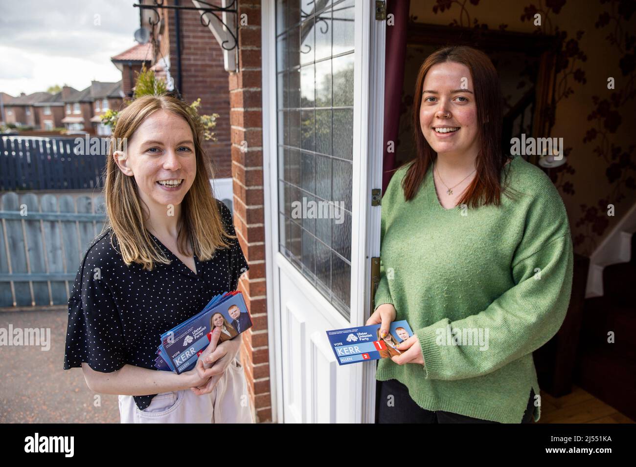 Lauren Kerr (left), UUP Belfast East candidate in upcoming the 2022 Northern Ireland Assembly election poses with Rachel Lemon while canvassing in east Belfast. Stock Photo