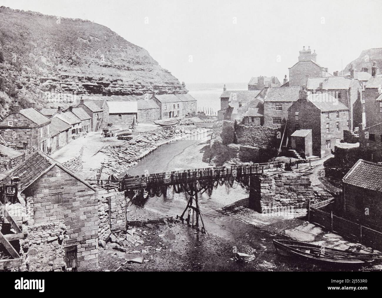 Staithes, Scarborough, North Yorkshire, England, seen here in the 19th century.  From Around The Coast,  An Album of Pictures from Photographs of the Chief Seaside Places of Interest in Great Britain and Ireland published London, 1895, by George Newnes Limited. Stock Photo