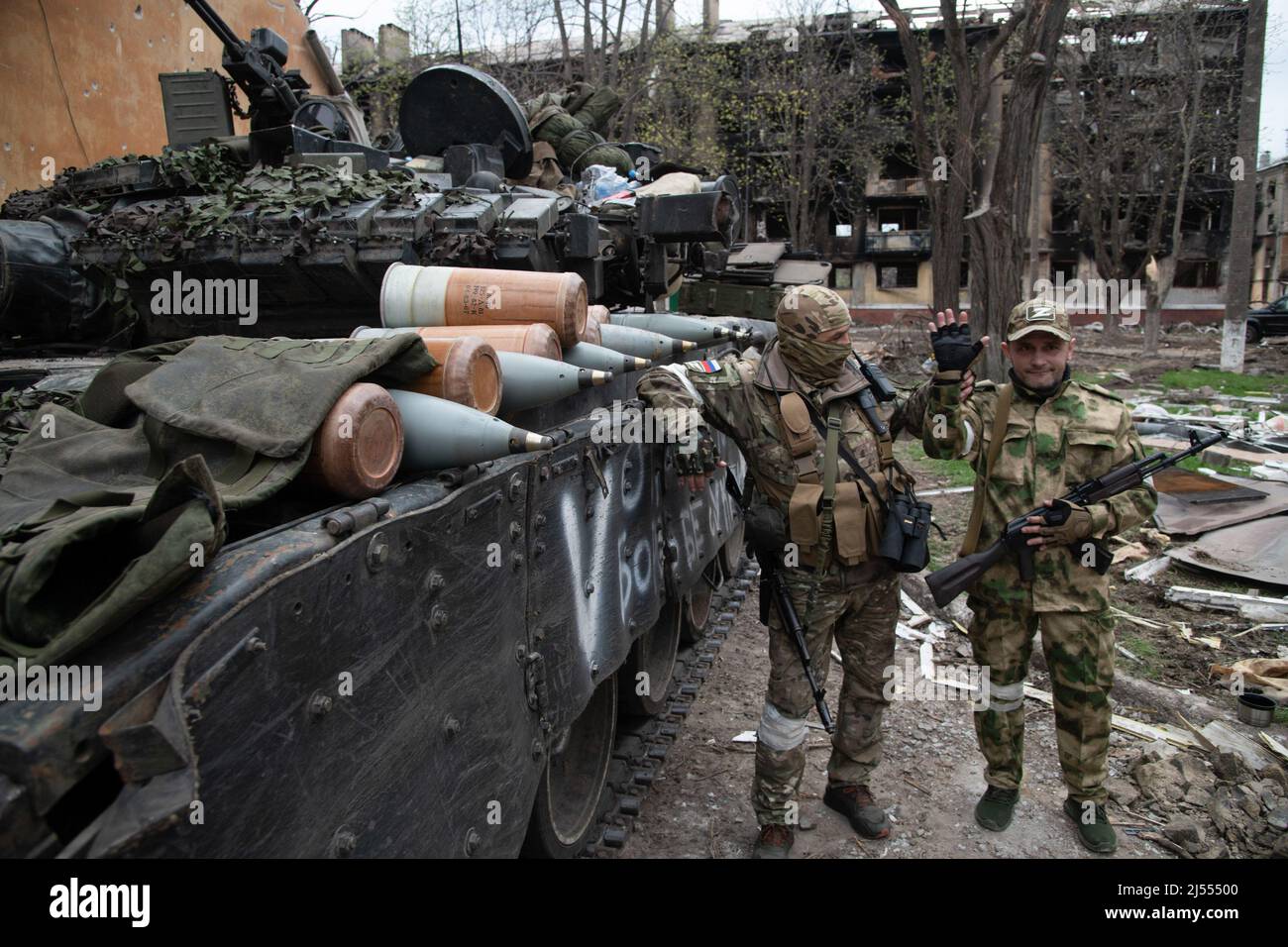 Azov Division Mariupol, Ukraine. 18th Apr, 2022. Russian soldiers pose by a T-80 tank ...