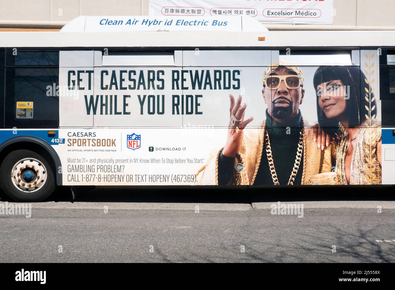 An ad on the side of a New York City bus for Caesars Sportsbook, and online sports gambling site. Online betting is now legal in New York. Stock Photo