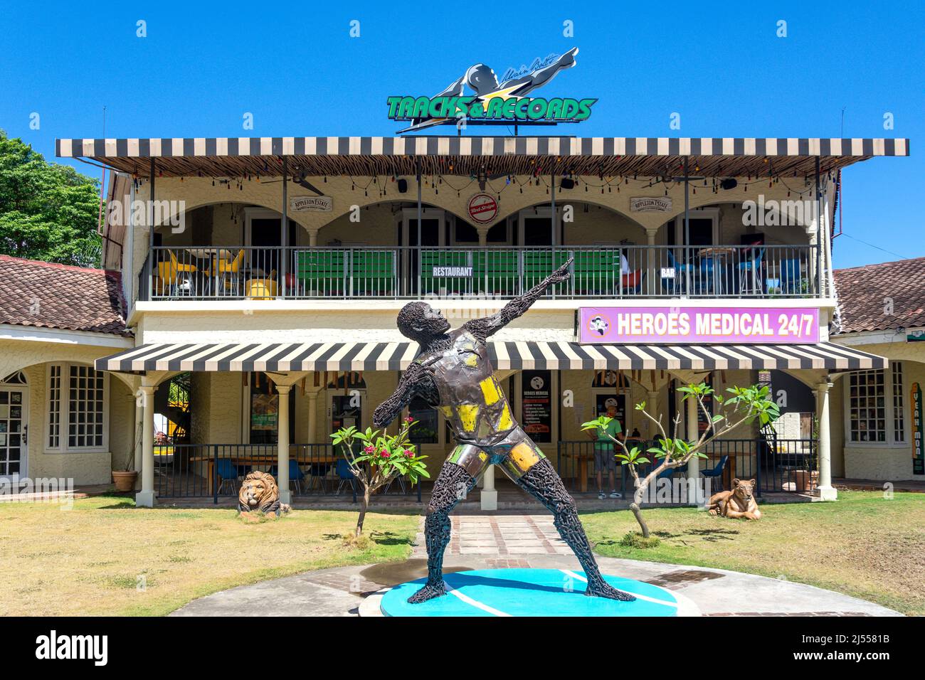 Usain Bolt's statue and Tracks & Records Restaurant, St James Plaza, Montego Bay, St James Parish, Jamaica, Greater Antilles, Caribbean Stock Photo