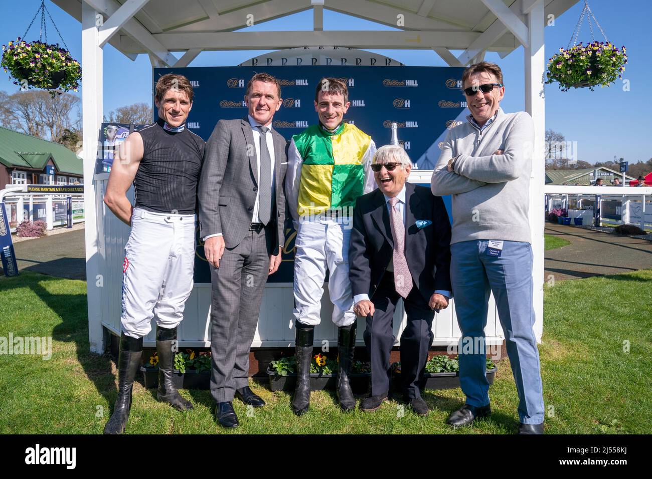(Left to right) Harry Skelton, Sir AP McCoy, Brian Hughes, Willie Carson and Peter Scudamore after the champion jockey elect won his 200th season win at Perth Racecourse. Picture date: Wednesday April 20, 2022. Stock Photo