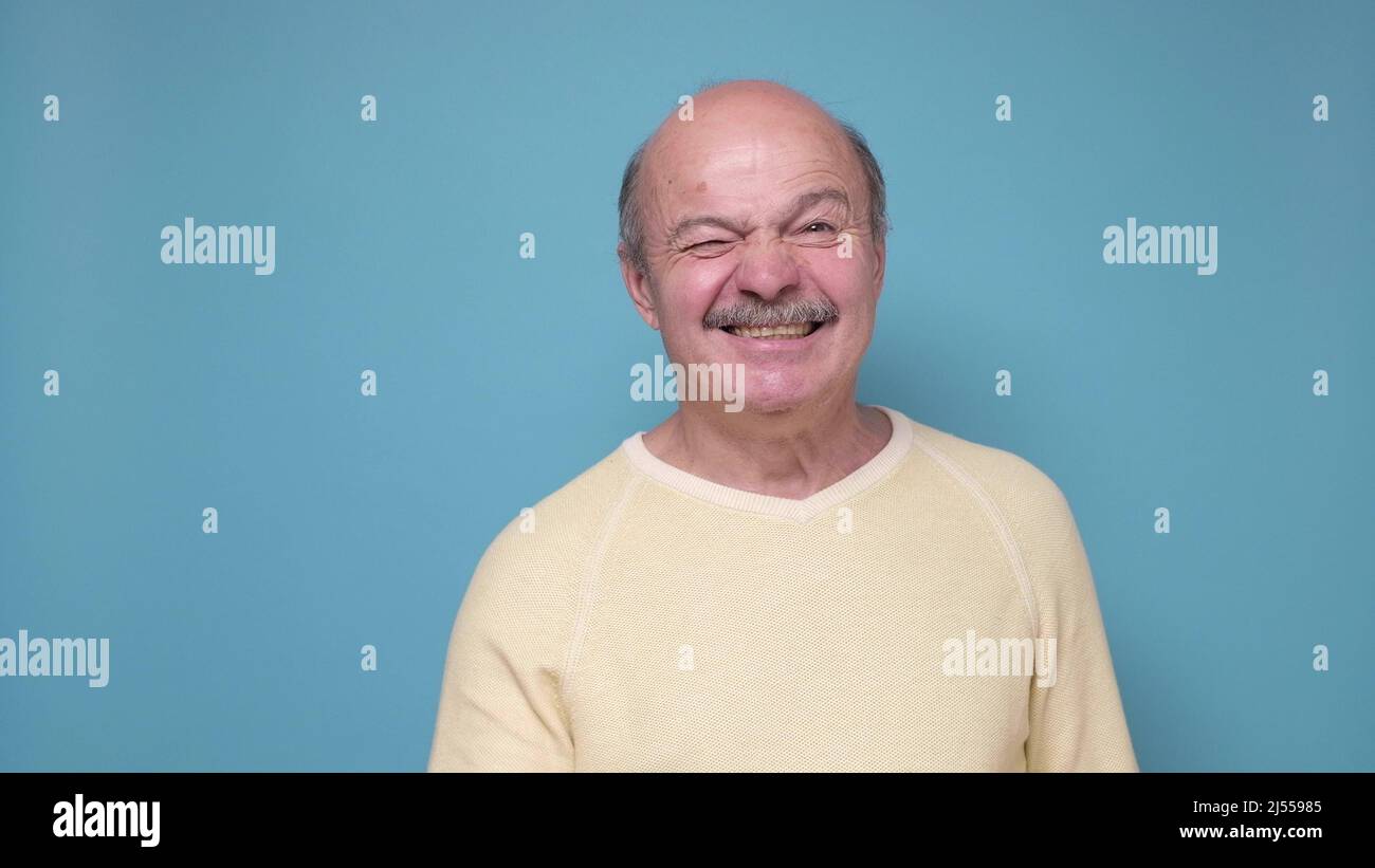 Bald man making funny face hi-res stock photography and images - Alamy