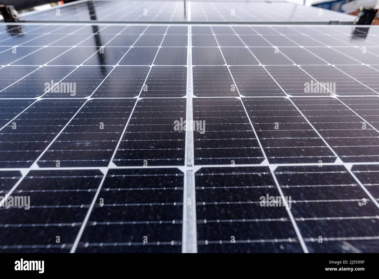 Photovoltaic cells on solar panel of PV system, selective focus Stock Photo