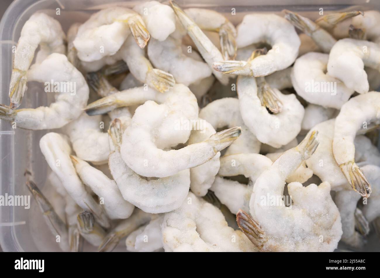 Frozen shrimp in fridge at the fish market. Healthy eating and fish