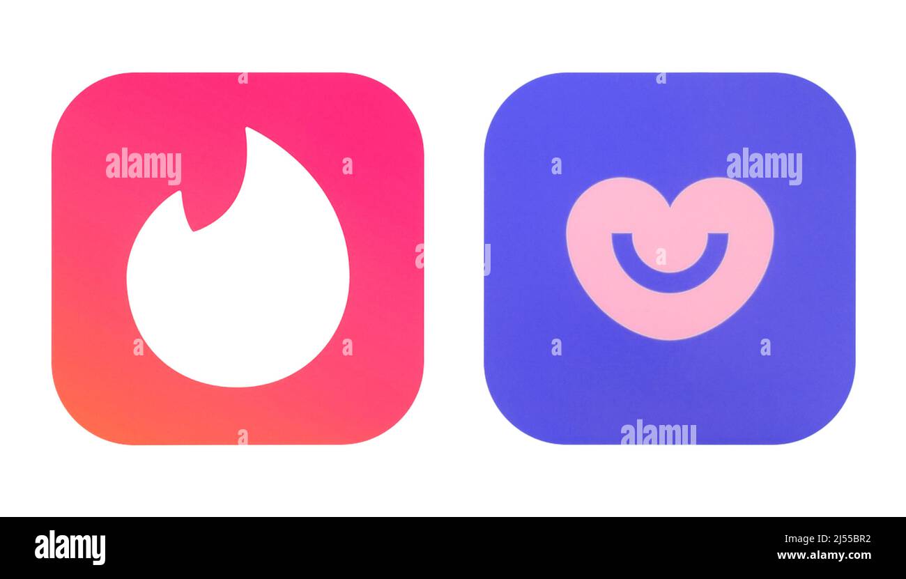 Kiev, Ukraine - February 08, 2022: Set of popular dating mobile apps icons: Tinder and Badoo, printed on white paper Stock Photo