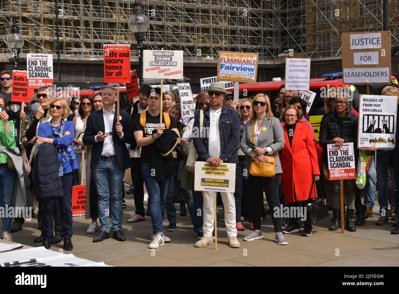 London, England, UK. 20th Apr, 2022. Protesters hold placards at the rally. Leaseholders held a protest in front of the Houses of Parliament, urging the government to protect tenants from having to pay to remove unsafe cladding as the Building Safety Act returns to the House of Commons. (Credit Image: © Thomas Krych/ZUMA Press Wire) Stock Photo