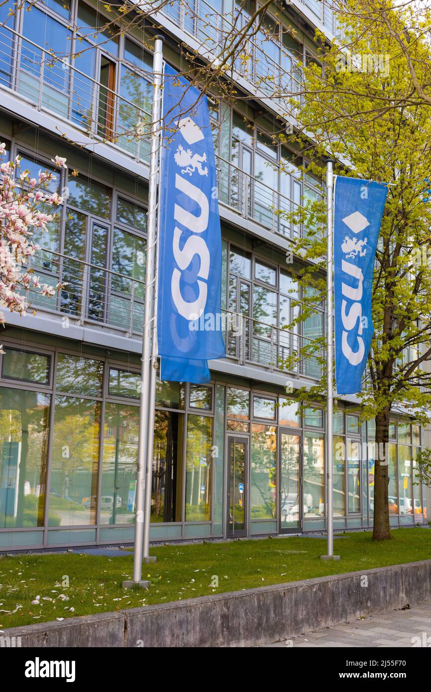 Munich, GERMANY - April 19, 2022: Flags of the bavarian political party CSU in front of the 'Franz-Josef-Strauss' building in Munich, the headquarter Stock Photo