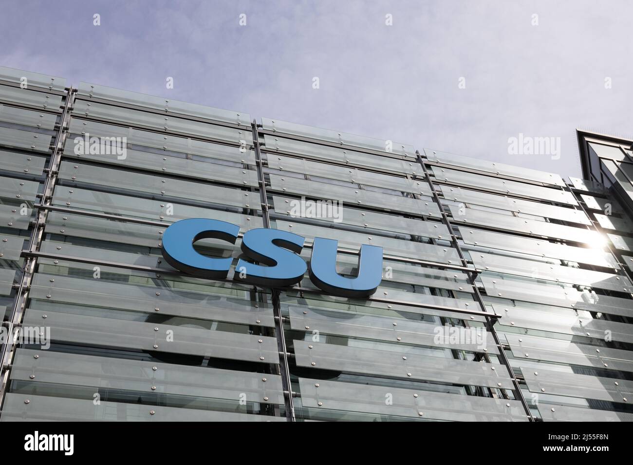Munich, GERMANY - April 19, 2022: The letters CSU on the facade of the 'Franz-Josef-Strauss' building in Munich, the headquarter of the bavarian party Stock Photo