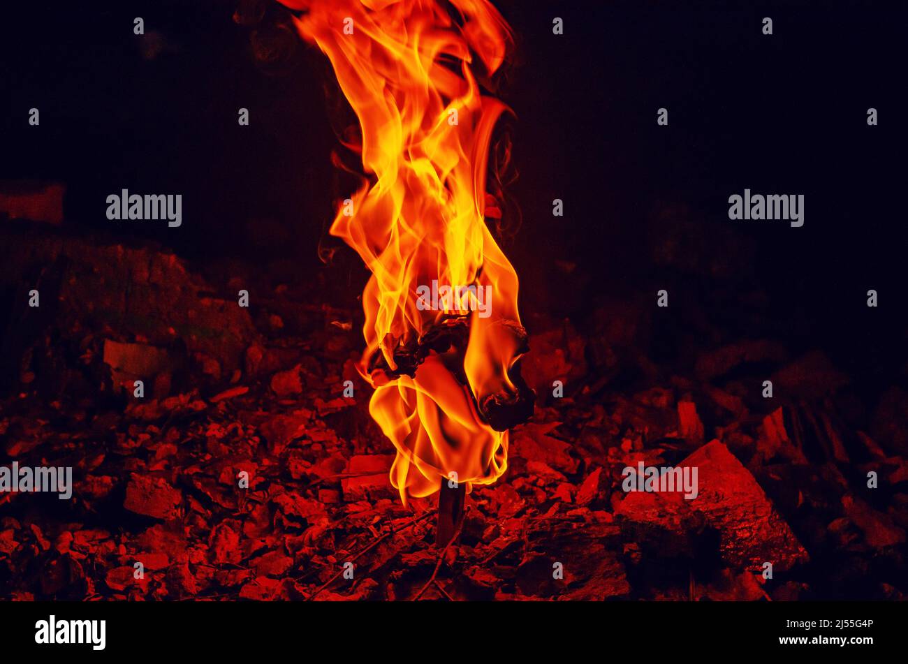 High pillar of fire coming out of stone. Red fire burning flame Stock Photo Alamy