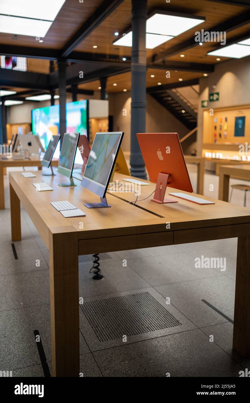 Interior view of Apple Store in Madrid Puerta del Sol without people inside Stock Photo