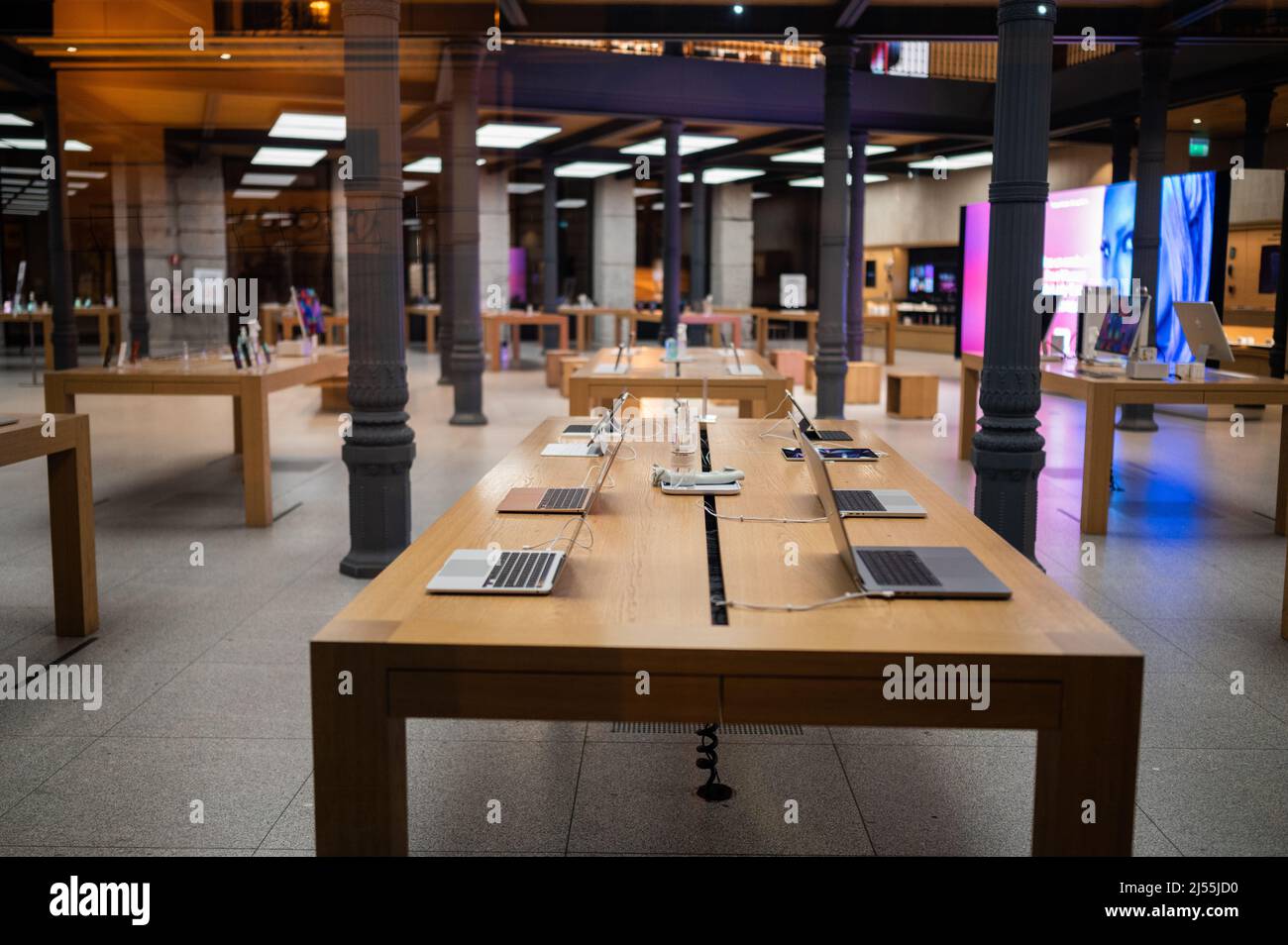 Interior view of Apple Store in Madrid Puerta del Sol without people inside Stock Photo