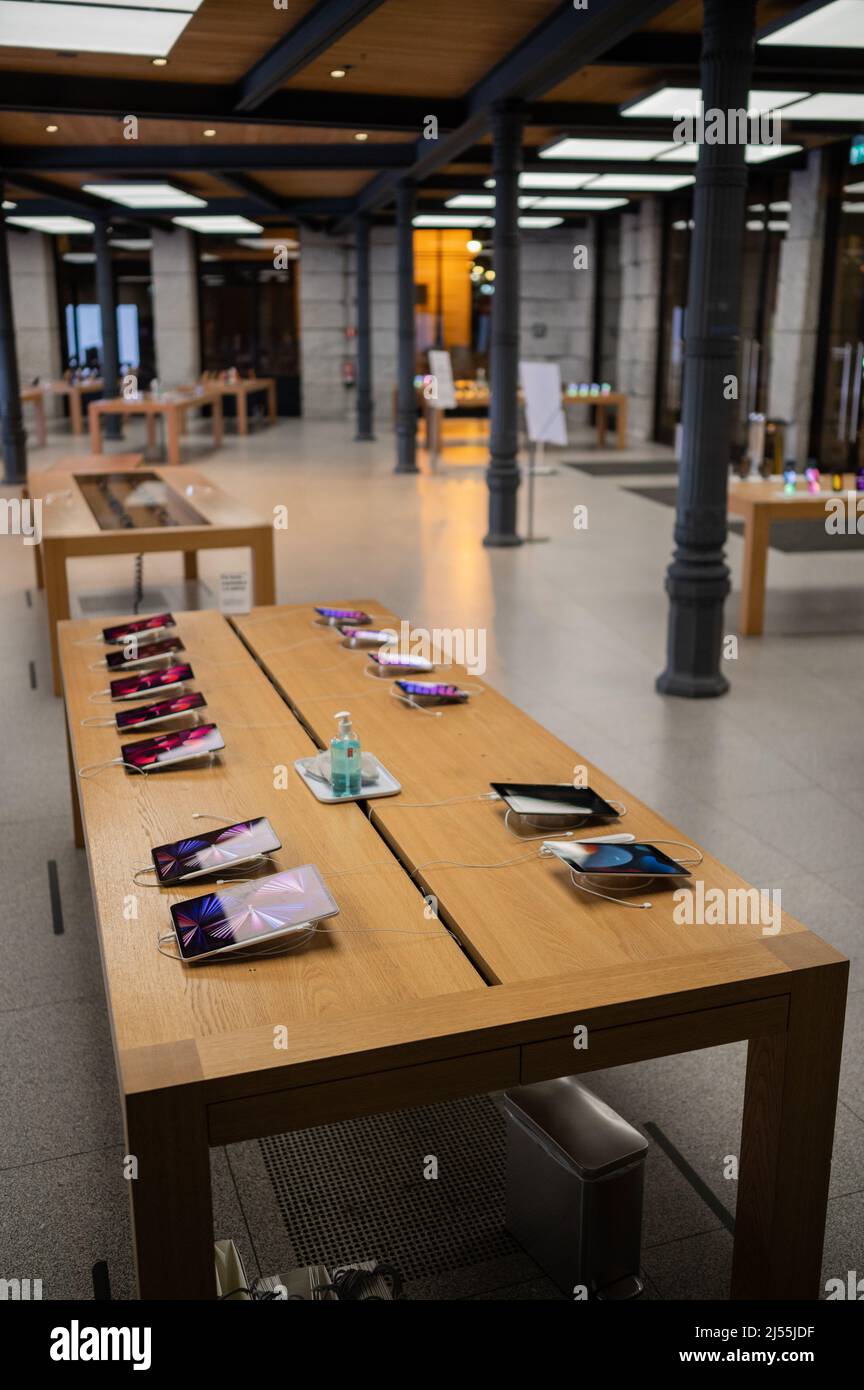 Interior view of Apple Store in Madrid Puerta del Sol without people inside Stock Photo