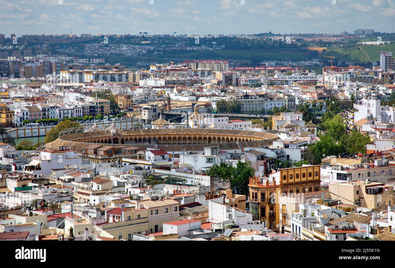 The Bullring ( centre ) and Skyline  view of Seville as viewed from La Giralda Tower attached to the  Cathedral in Seville, Spain, April 2022 Stock Photo