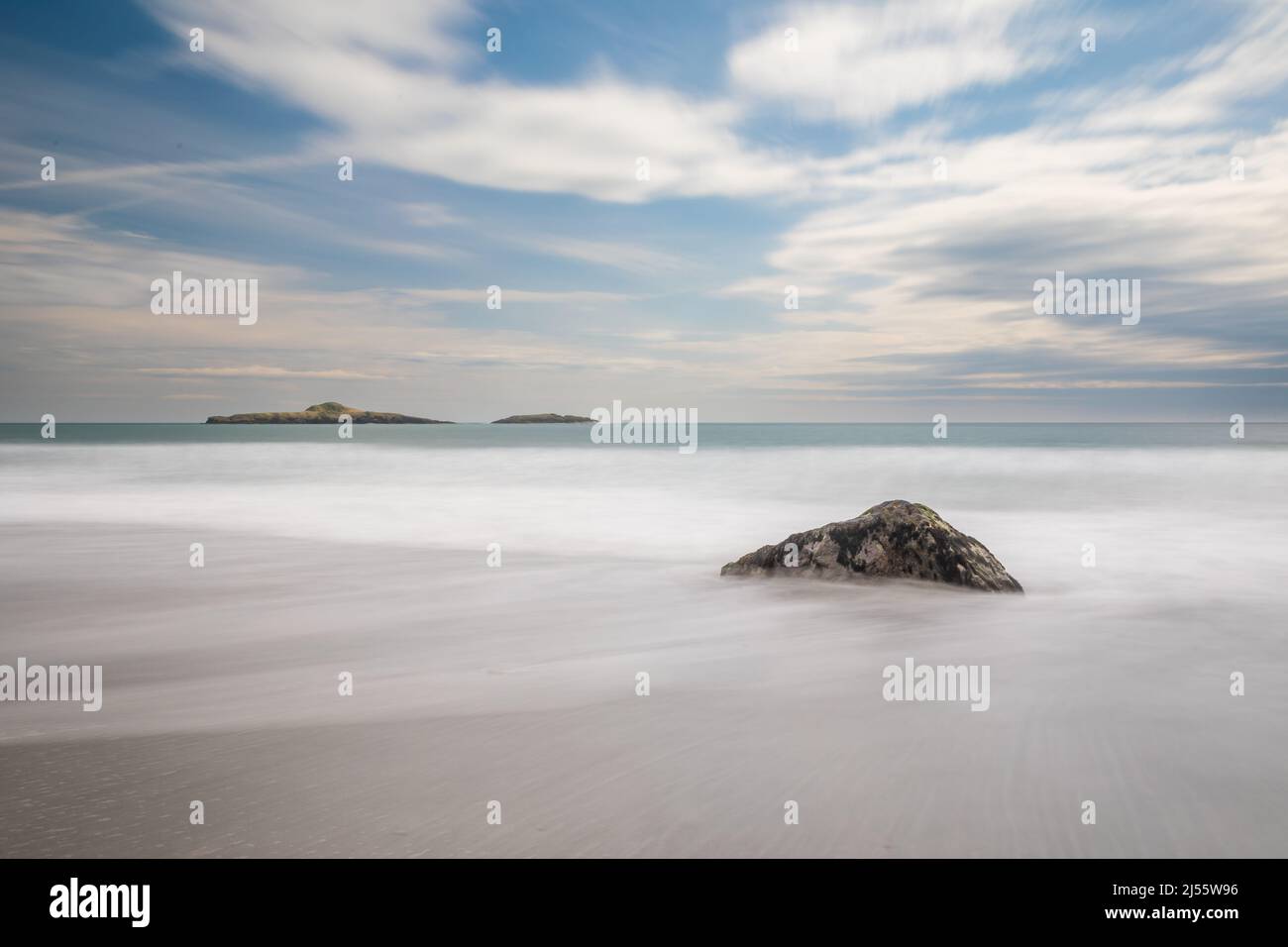 High tide at Aberdaron beach, with Ynys Gwylan-fawr and Ynys Gywlan ...