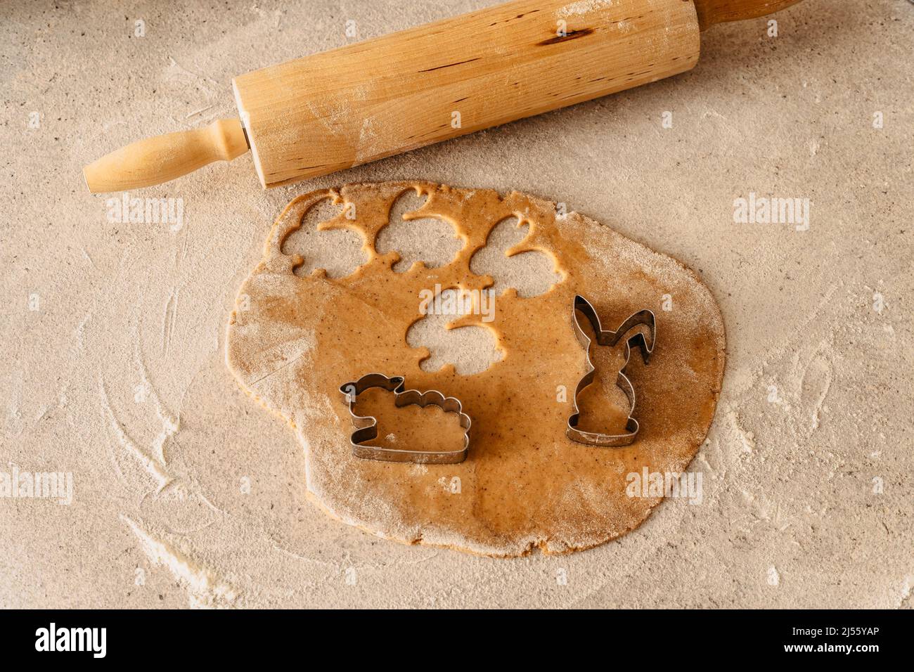 Easter baking flat lay.Spring symbols made from gingerbread.Homemade cookies.Easter bunny,rabbit,eggs and ducks from delicious honey dough.Happy Easte Stock Photo