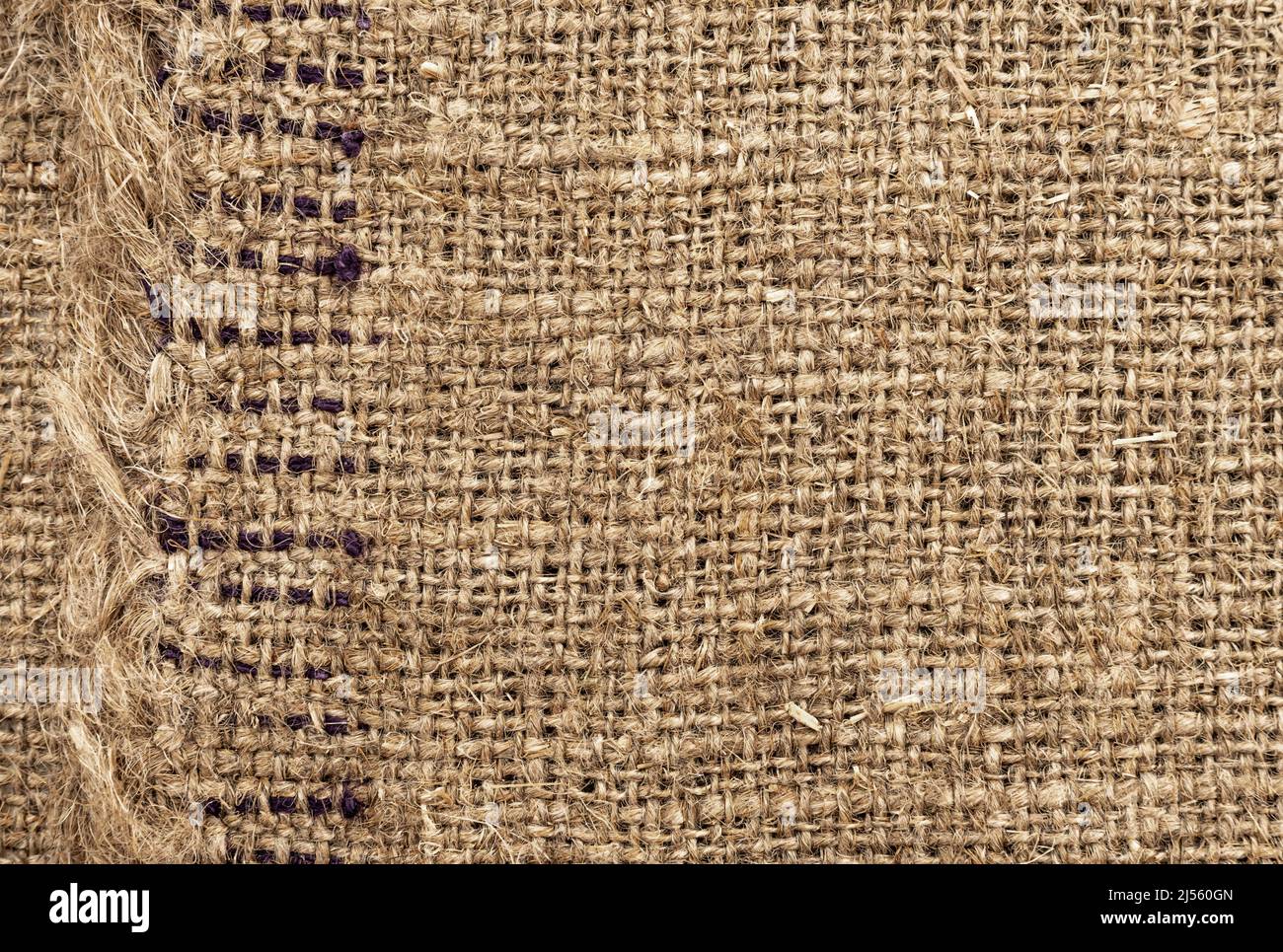 Sacking Cloth. The texture of the burlap fabric is close-up. Packaging material ...