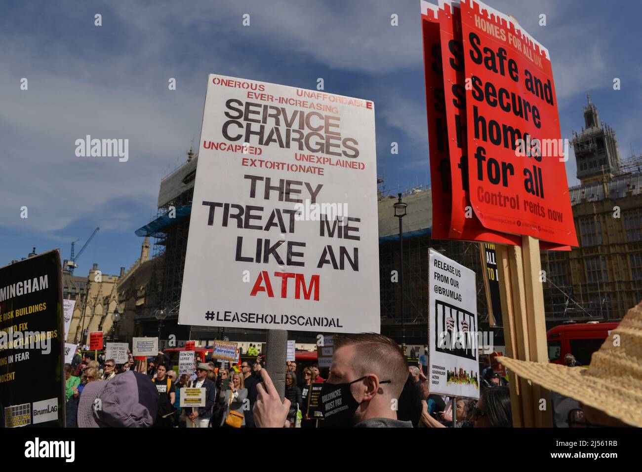 Protesters hold placards expressing their opinion during the demonstration. Leaseholders held a protest in front of the Houses of Parliament, urging the government to protect tenants from paying to remove unsafe cladding as the Building Safety Act returns to the House of Commons. (Photo by Thomas Krych / SOPA Images/Sipa USA) Stock Photo