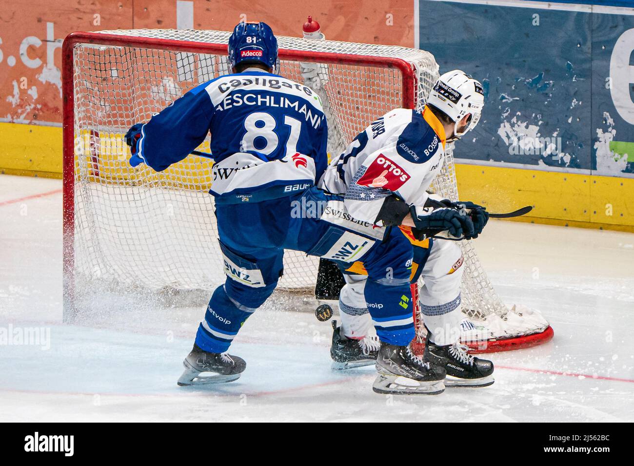 Yannick Zehnder 12 (EV Zug) deflects to 10 during the National League