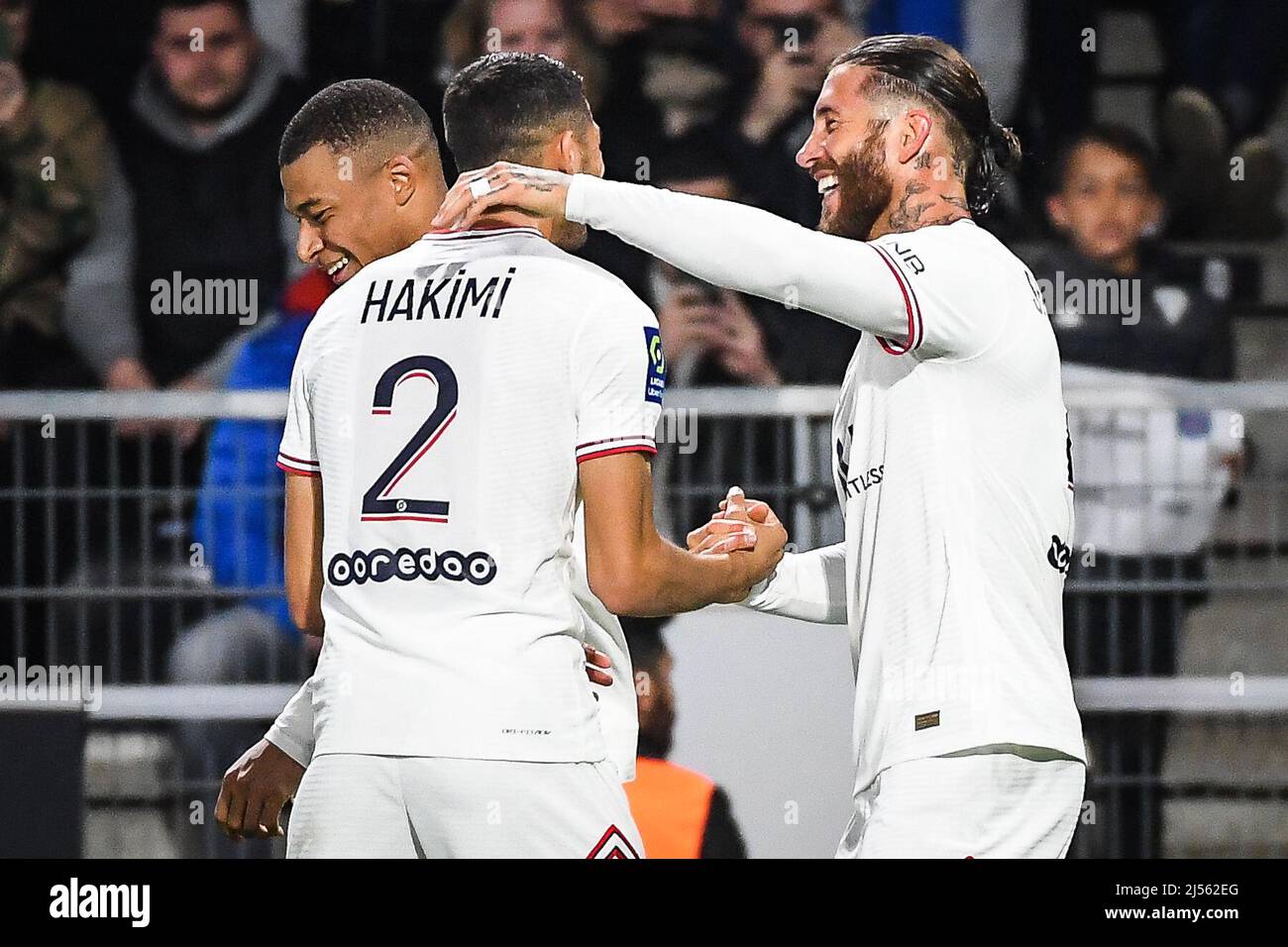 Angers, France, France. 20th Apr, 2022. Sergio RAMOS of PSG celebrate his goal with Achraf HAKIMI of PSG and Kylian MBAPPE of PSG during the Ligue 1 match between Angers SCO and Paris Saint-Germain (PSG) at Raymond-Kopa stadium on April 20, 2022 in Angers, France. (Credit Image: © Matthieu Mirville/ZUMA Press Wire) Stock Photo
