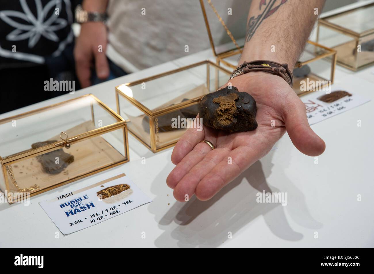 Piece of chocolate hashish (close up), on display at the trade show “Indicasativa 2022”.devoted to the hemp world. Stock Photo