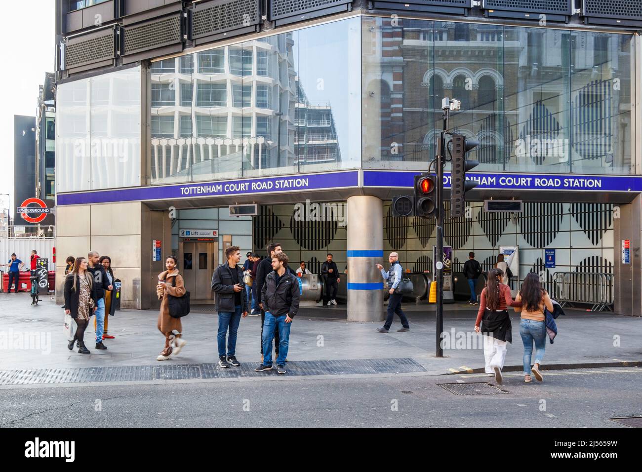 Pedestrian crossing outside Tottenham Court Road underground station on Oxford Street, London, UK Stock Photo