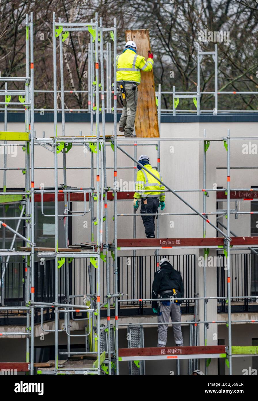 Construction site, scaffolding, dismantling of scaffolding on a residential building, Germany Stock Photo
