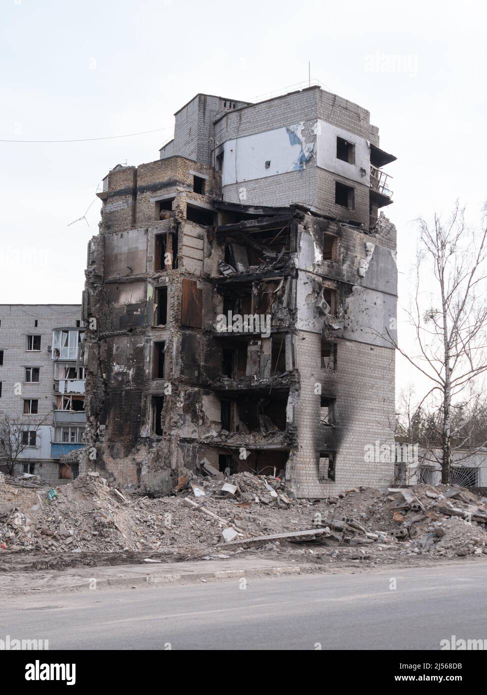 Russia's war against Ukraine. Russian bomb hit civilian buildings. War in Ukraine, ruined building after bombing. estroyed buildings after the bombing, close-up. Bodyanka, Kyiv region, Ukraine 2022 Stock Photo