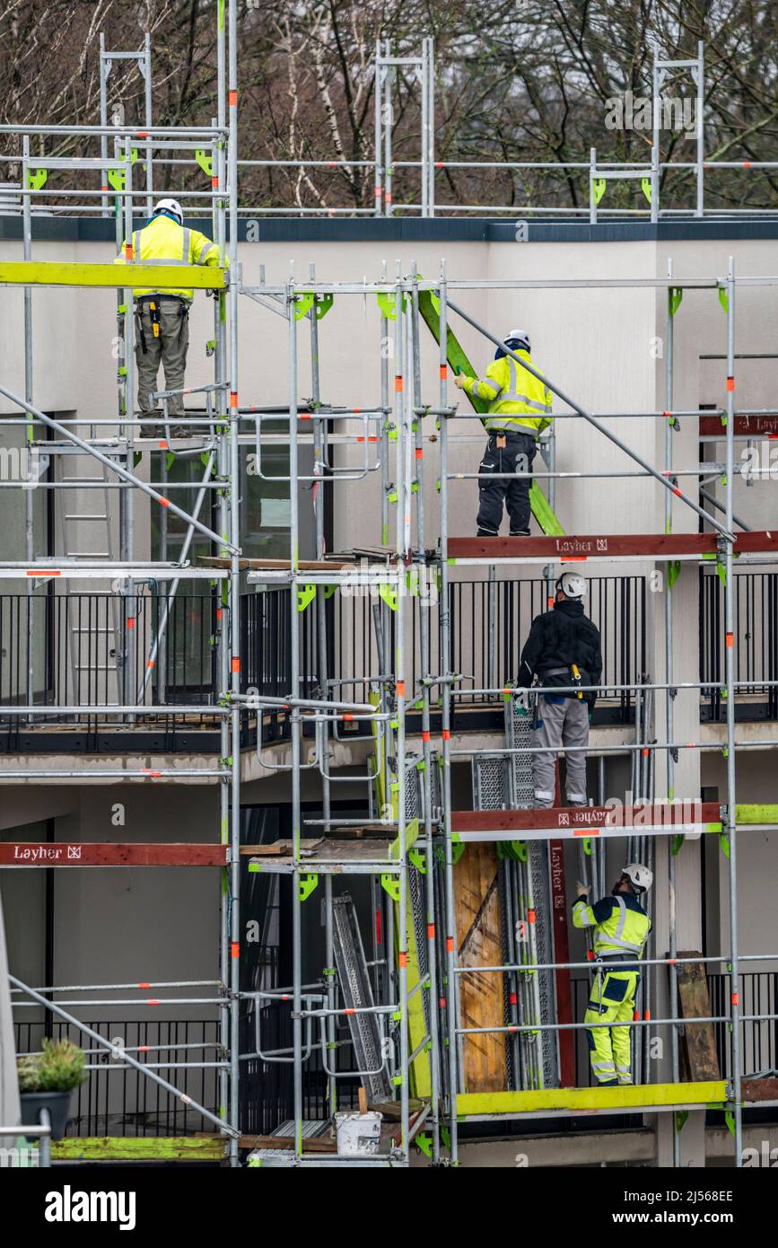 Construction site, scaffolding, dismantling of scaffolding on a residential building, Germany Stock Photo