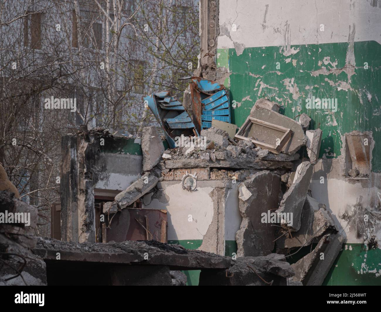 War 2022. Russian aggression and military invasion of Ukraine. Destroyed houses after rocket and air strikes. Bombed houses of civilians in the Ukrainian cities of Mariupol, Kharkov, Bucha, Irpen. Stock Photo